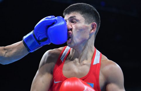 TOPSHOT - USA's Carlos Zenon Balderas Jr. lands a punch on Kazakhstan's Berik Abdrakhmanov during the Men's Light (60kg) match at the Rio 2016 Olympic Games at the Riocentro - Pavilion 6 in Rio de Janeiro on August 6, 2016. / AFP PHOTO / Yuri CORTEZYURI CORTEZ/AFP/Getty Images ** OUTS - ELSENT, FPG, CM - OUTS * NM, PH, VA if sourced by CT, LA or MoD **